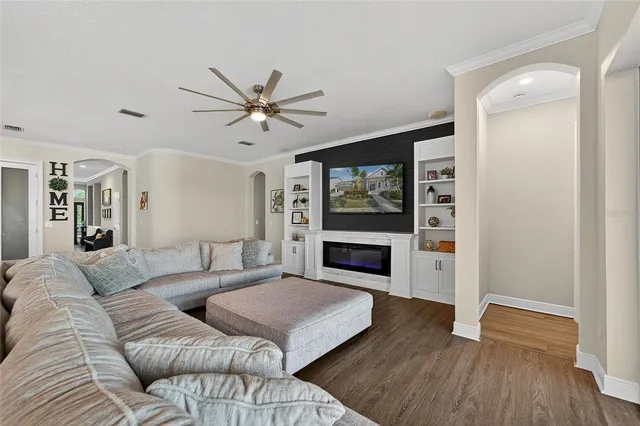 a bedroom with a bed and a mirror