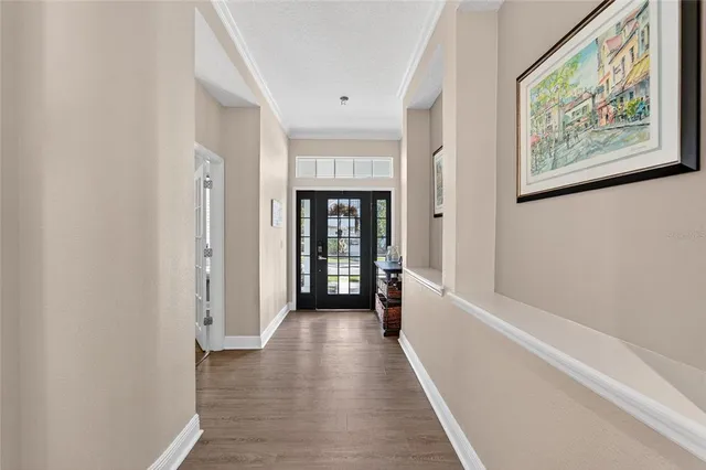 an aerial view of a house with a ocean view