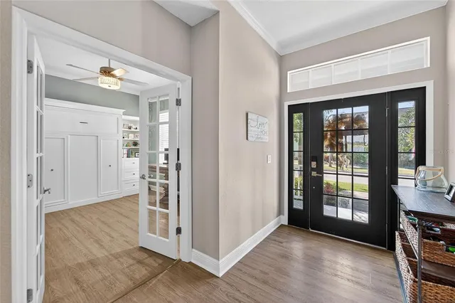 an aerial view of a house with a ocean view