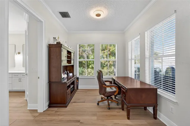 a view of swimming pool with outdoor seating