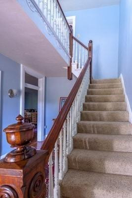 Charming, original stairway greets you a