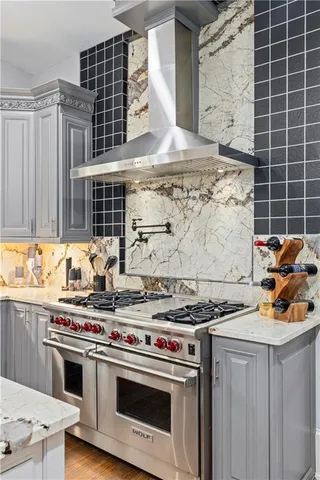 a living room with furniture fireplace and flat screen tv