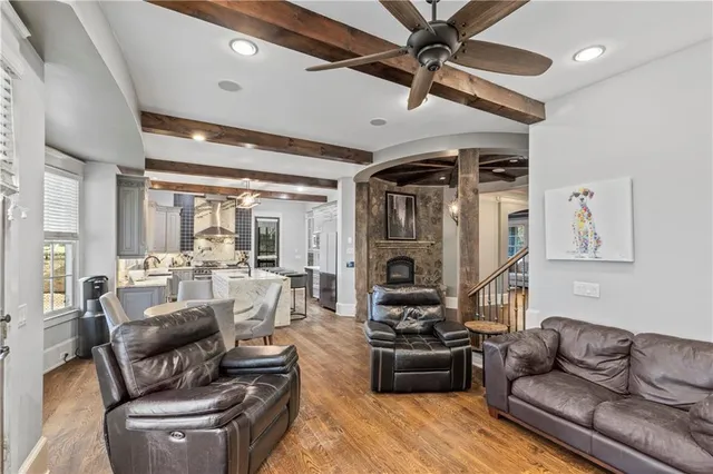 a spacious bedroom with a large bed and a window