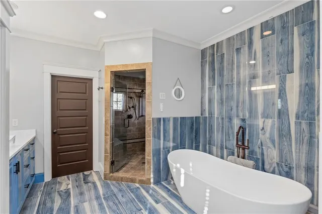 a bathroom with a toilet a sink and a mirror