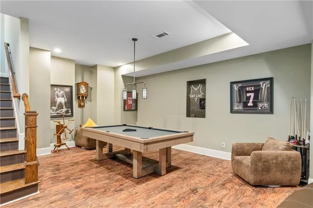 a view of a backyard with sitting area