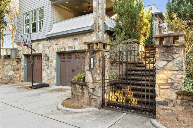 a view of a house with a street