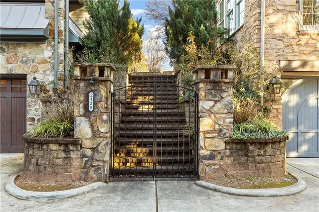 a view of a glass door with a yard
