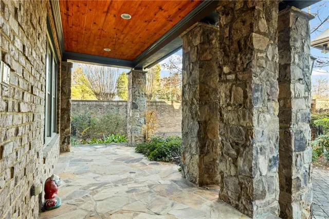 a front view of a house with a glass door