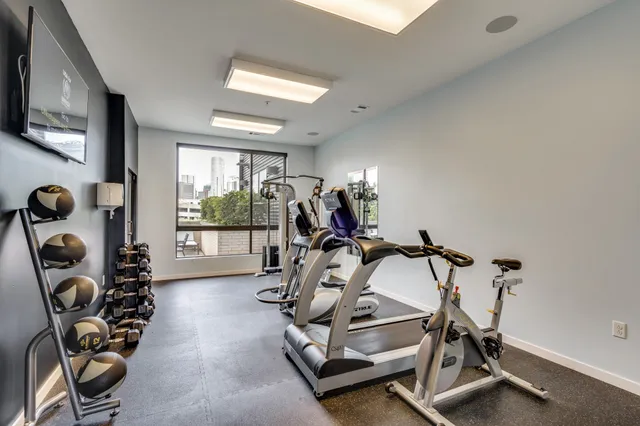 a view of a room with gym equipment