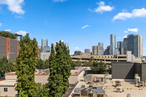 a view of a city with tall buildings