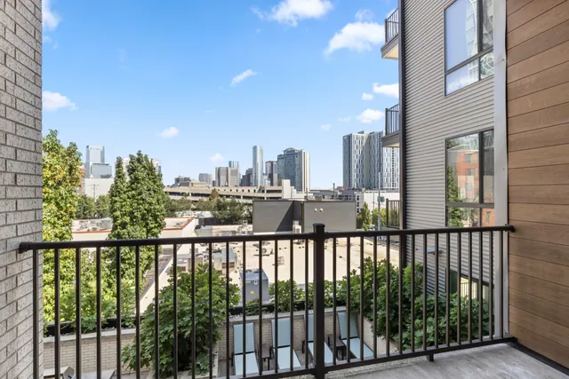 a view of a balcony with city view