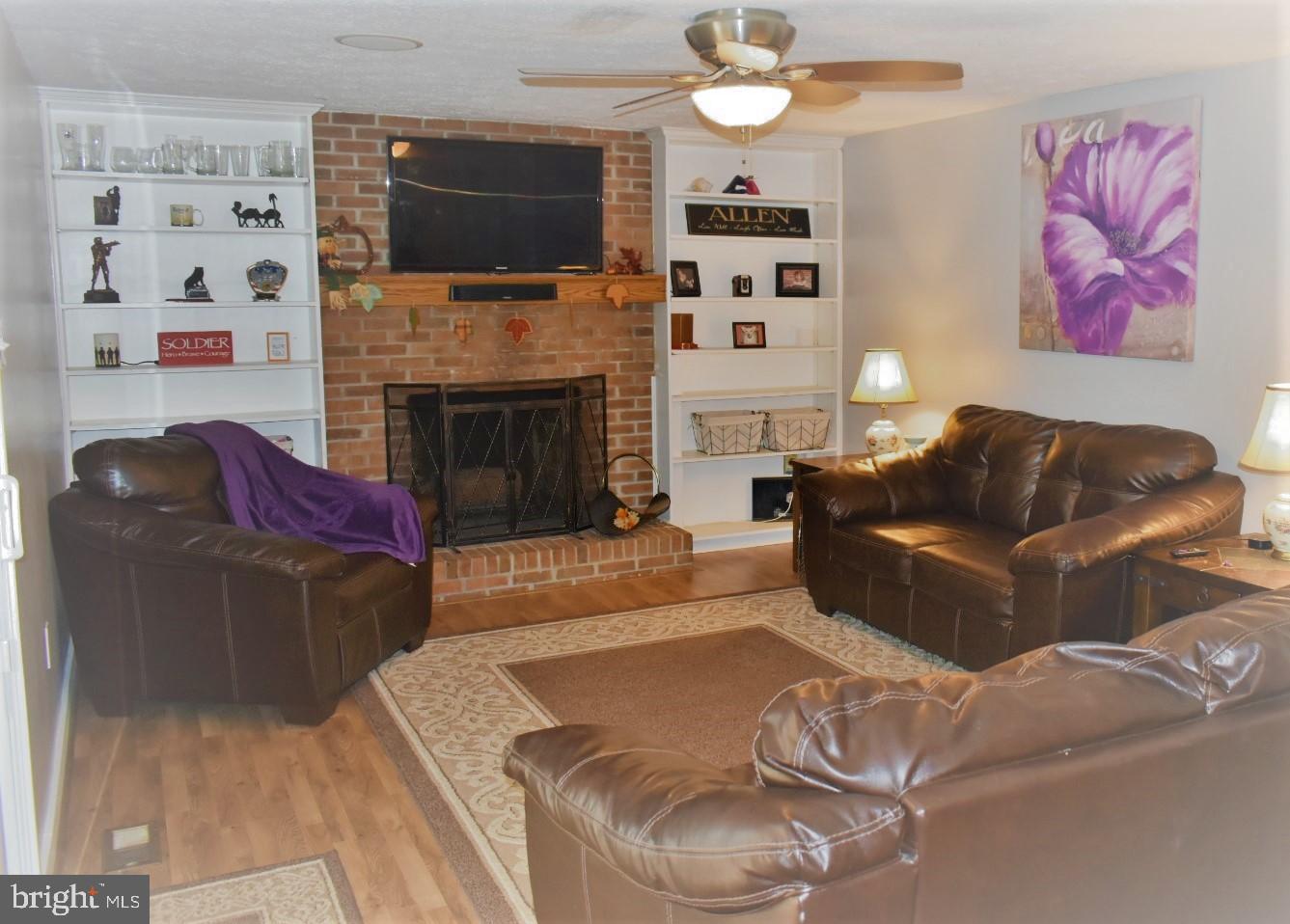 596 Pumphouse Road Frederick, MD 21703 - Photo 8 of 38 Recessed cabinets & Wood Burning Fireplace