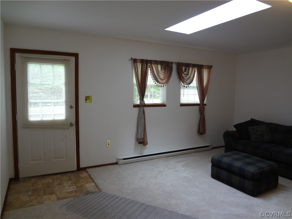 3198 Lowry Road Columbia, VA 23038 - Photo 18 of 19 a living room with furniture and a window