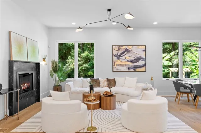 a view of a dining room with furniture and window