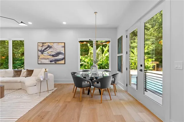 a bathroom with a sink a toilet and shower curtain