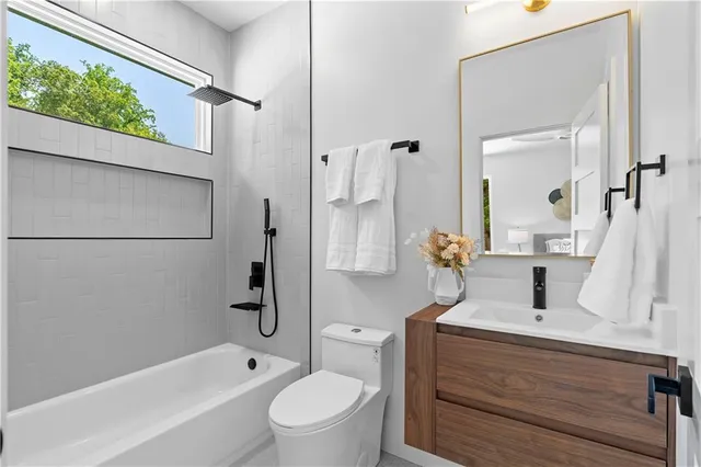 an aerial view of a house with swimming pool and garden