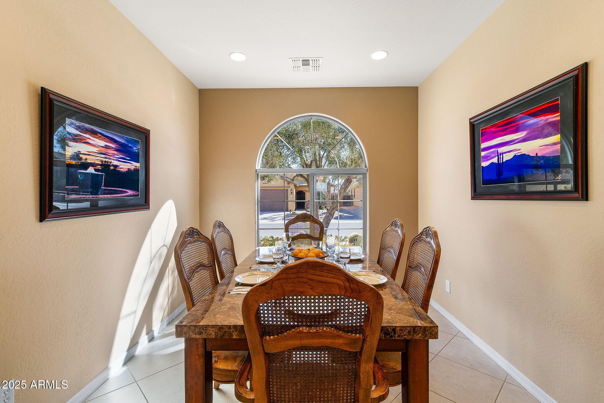 21280 North 262nd Drive Buckeye, AZ 85396 - Photo 16 of 51 a view of a dining room with furniture wooden floor and a window