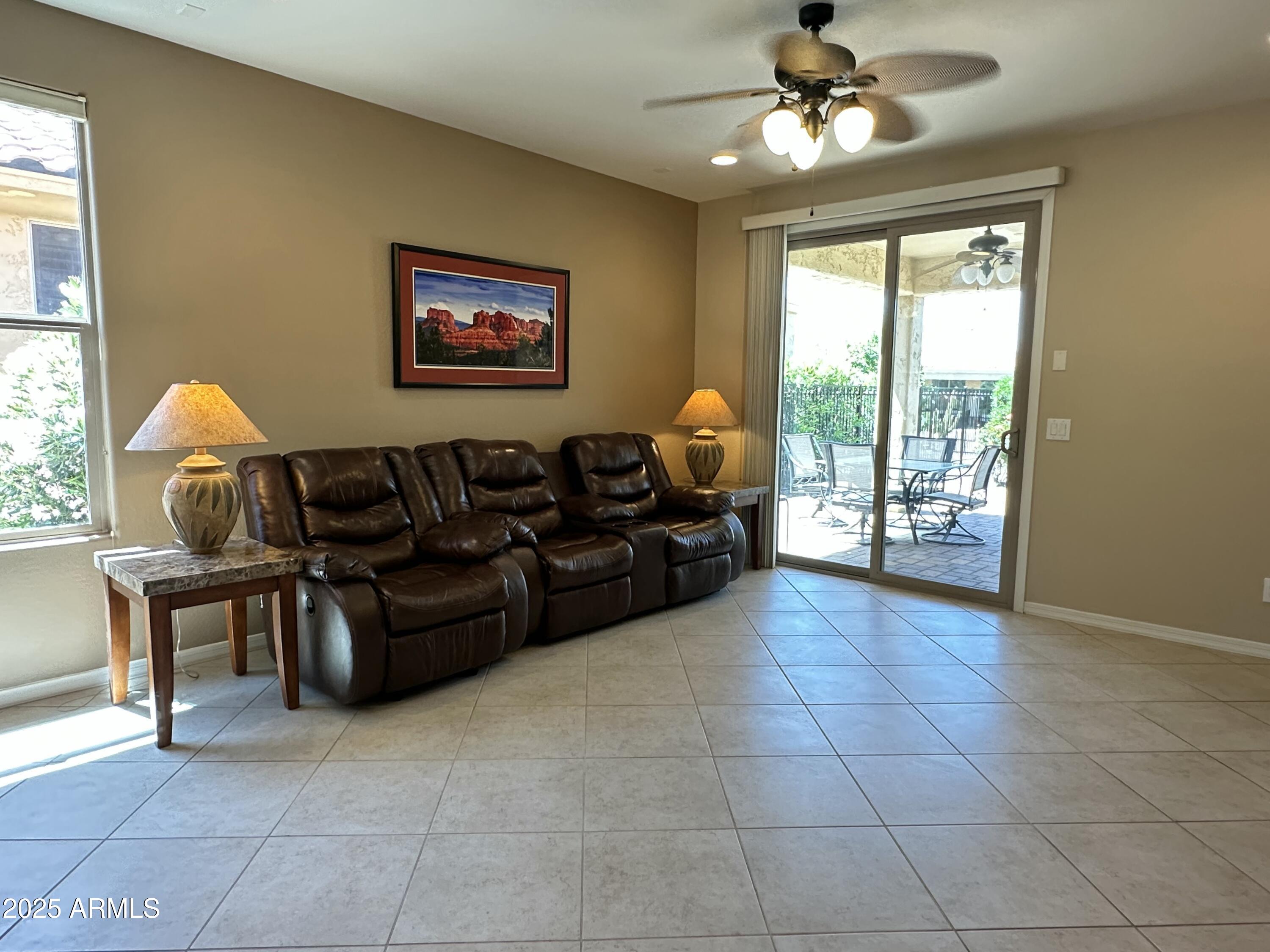 21280 North 262nd Drive Buckeye, AZ 85396 - Photo 20 of 51 a living room with furniture
