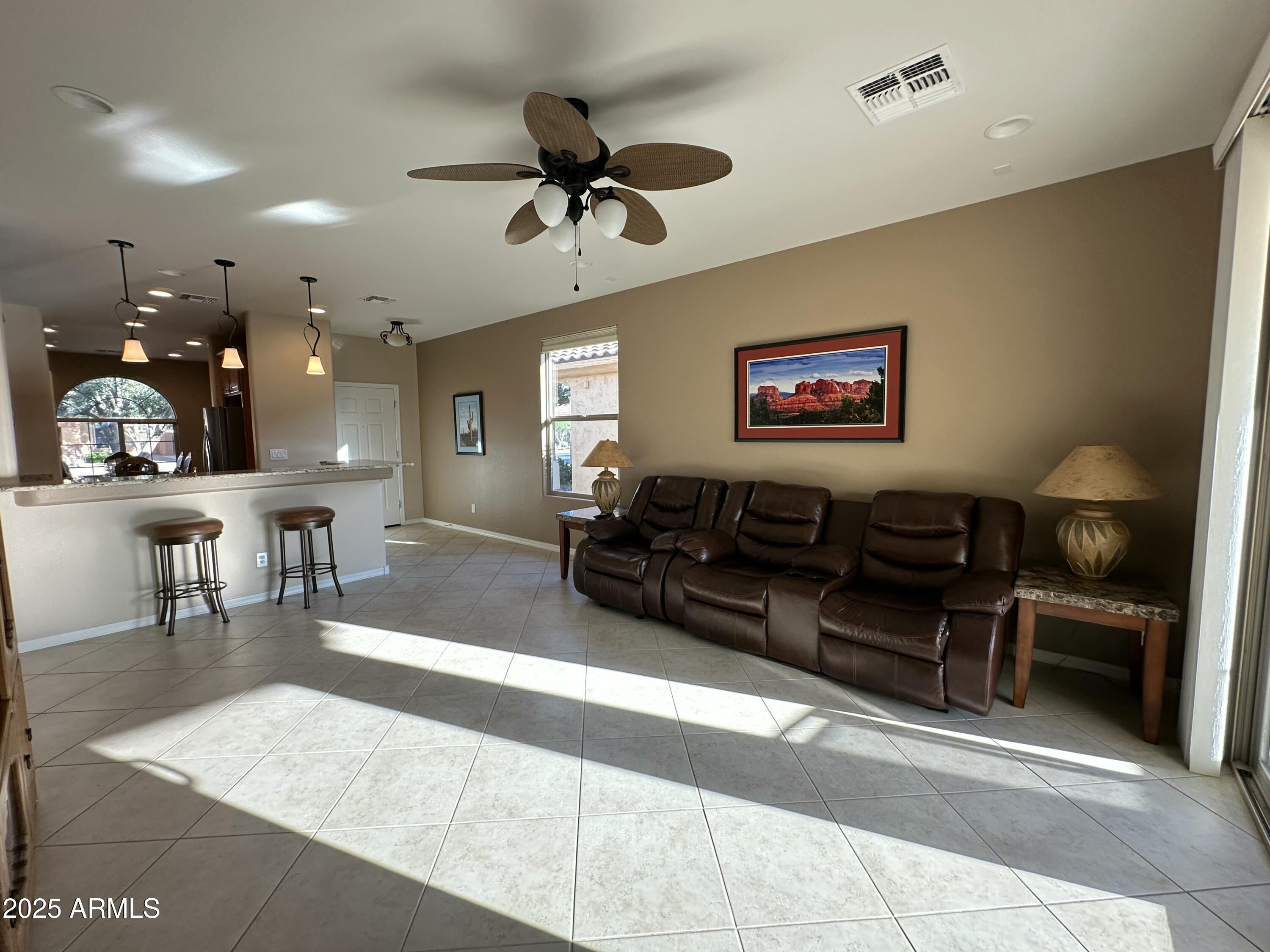 21280 North 262nd Drive Buckeye, AZ 85396 - Photo 22 of 51 a living room with furniture