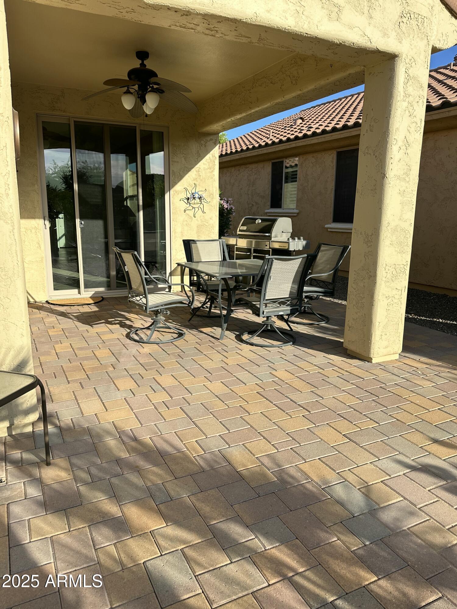 21280 North 262nd Drive Buckeye, AZ 85396 - Photo 33 of 51 a room with gym equipment and a table