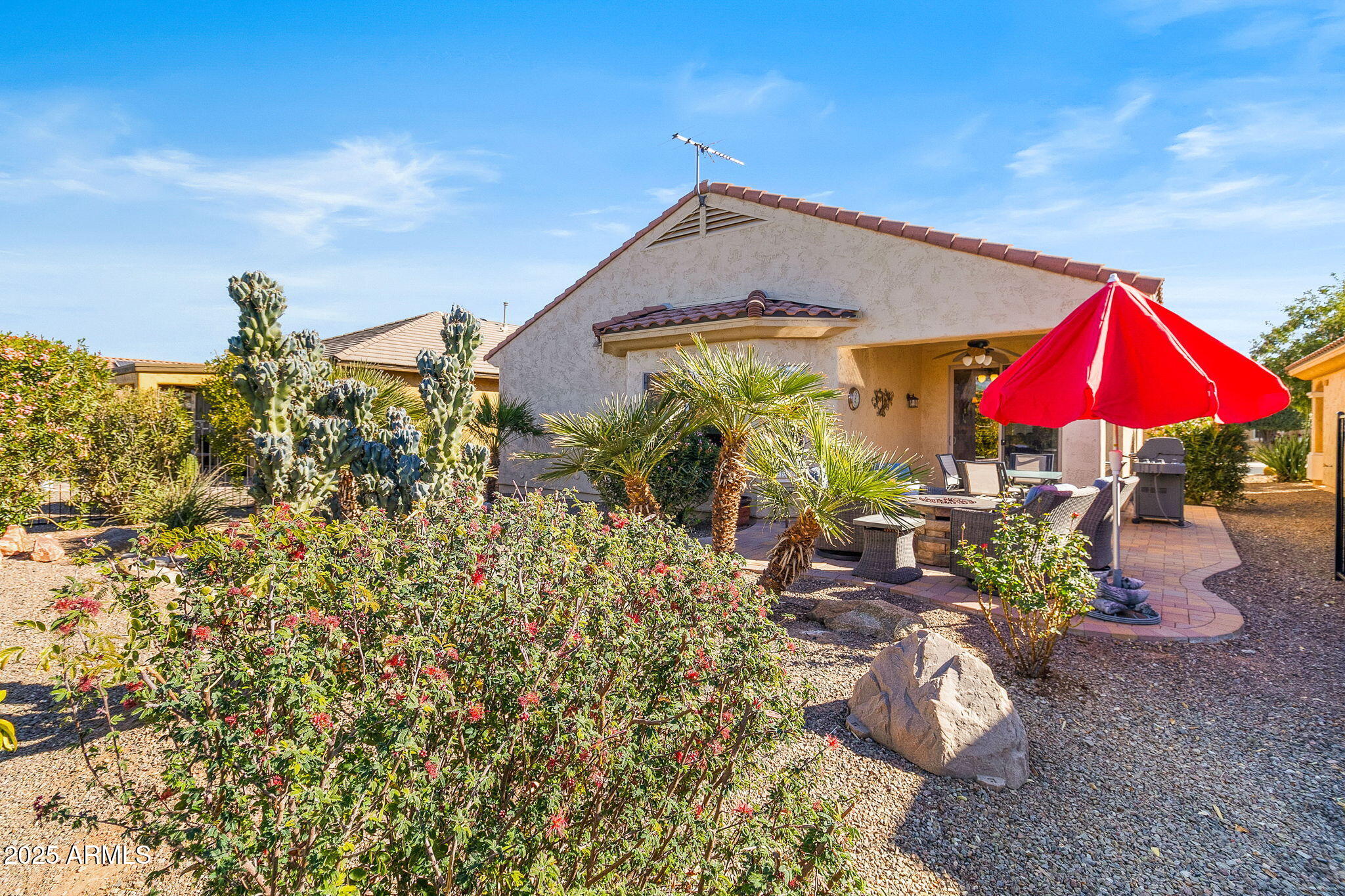 21280 North 262nd Drive Buckeye, AZ 85396 - Photo 35 of 51 an outdoor space with furniture