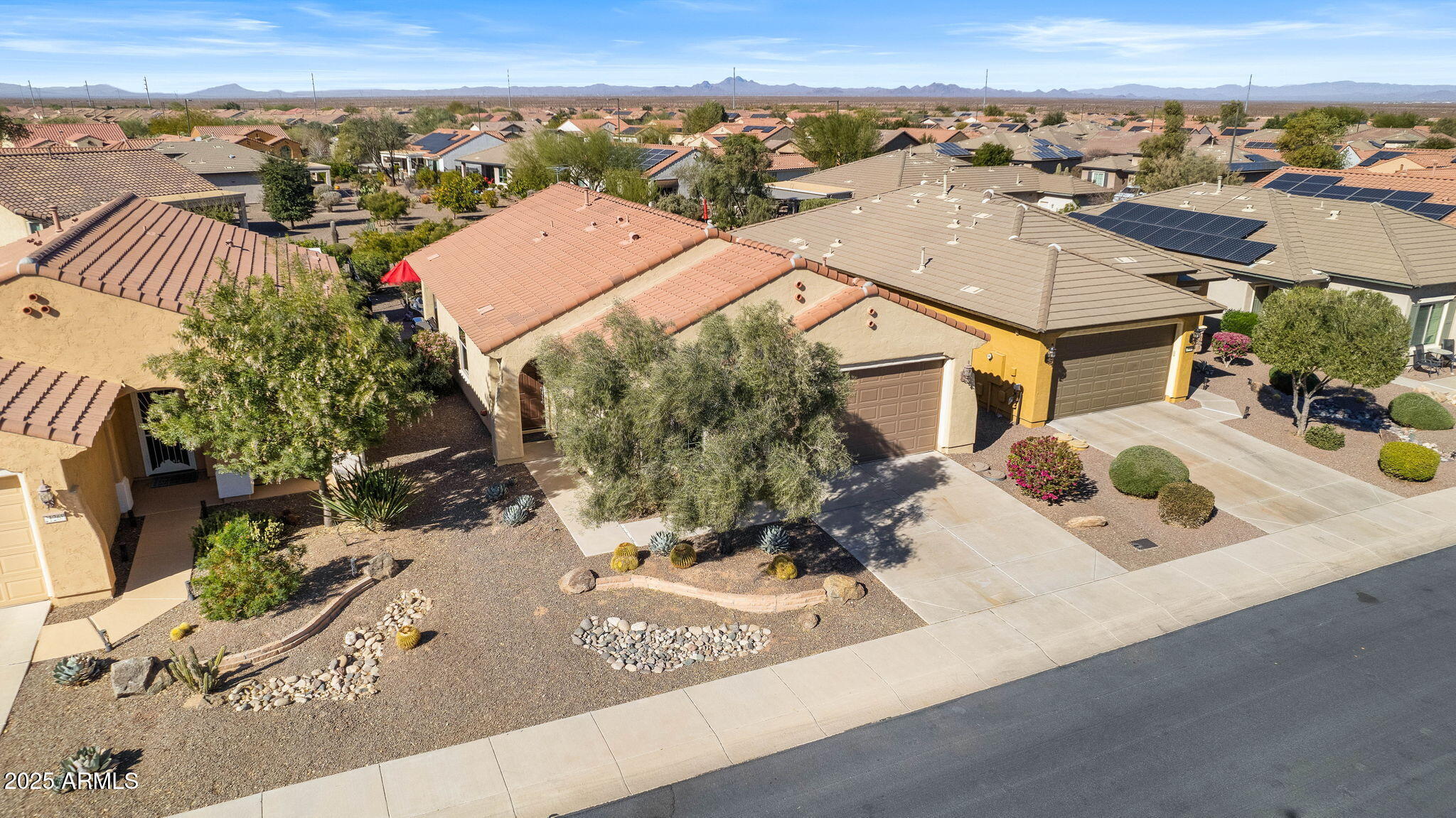21280 North 262nd Drive Buckeye, AZ 85396 - Photo 37 of 51 an aerial view of residential houses with outdoor space