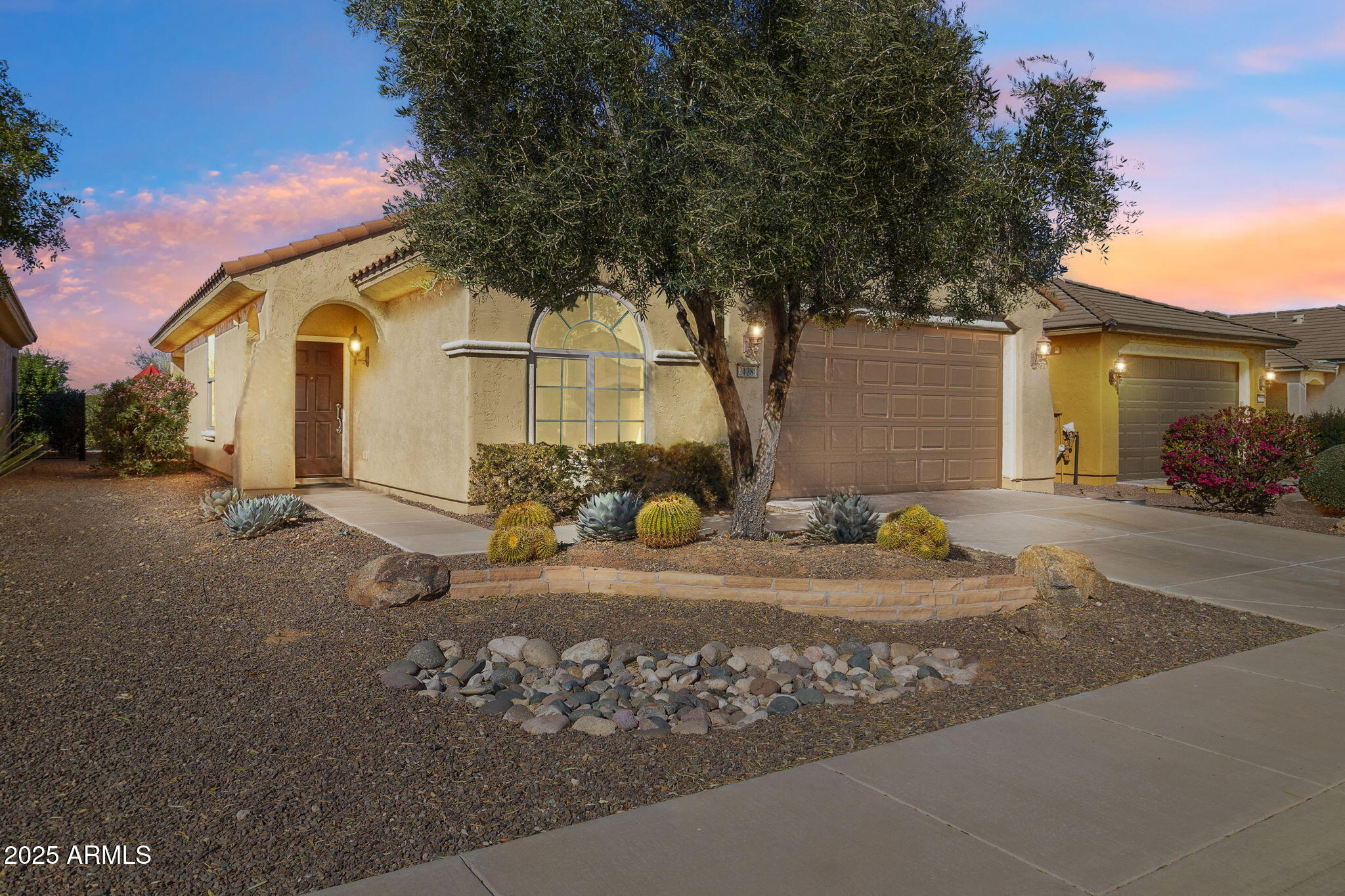 21280 North 262nd Drive Buckeye, AZ 85396 - Photo 50 of 51 a front view of a house with a yard