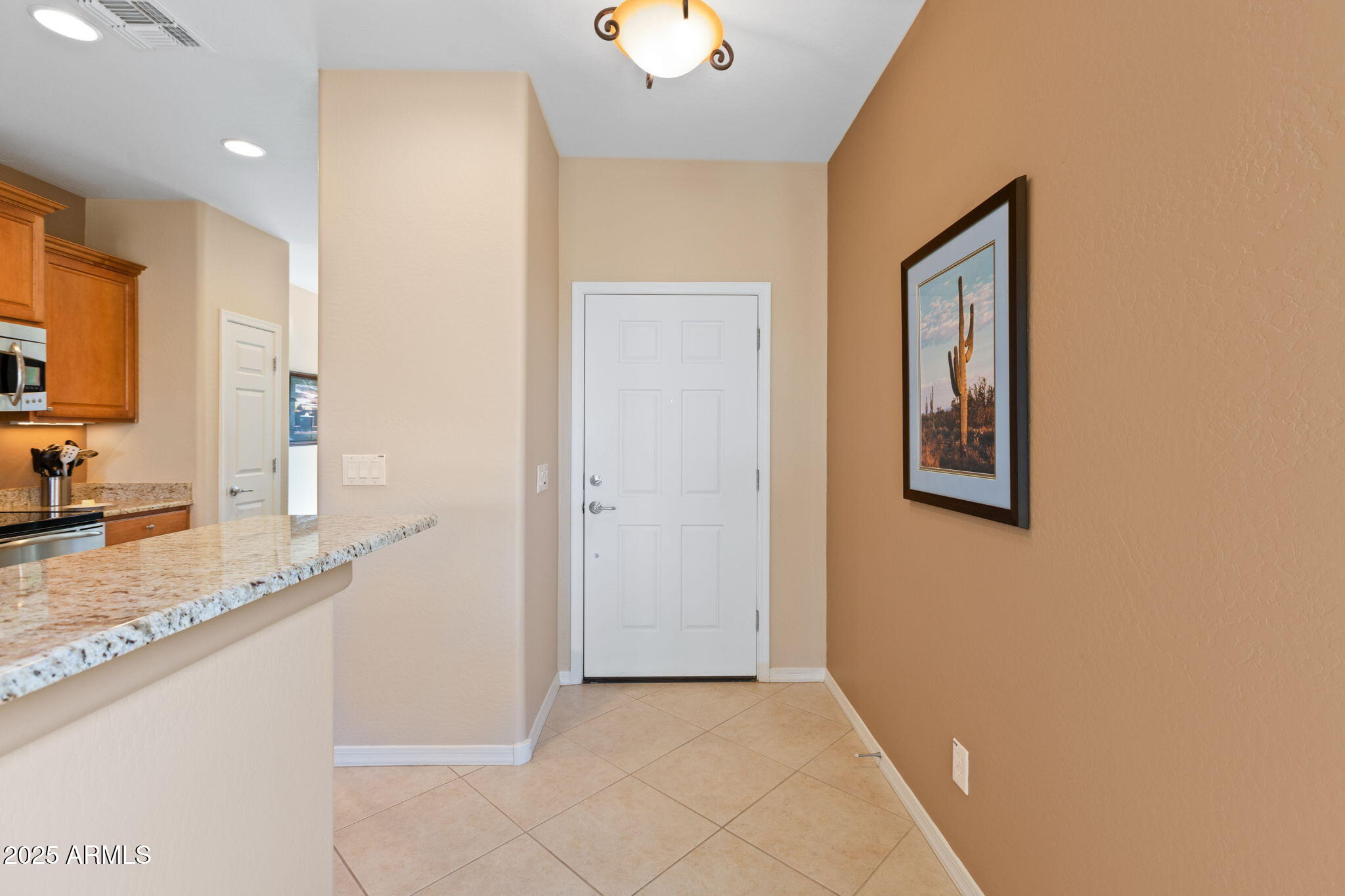 21280 North 262nd Drive Buckeye, AZ 85396 - Photo 8 of 51 a view of a kitchen cabinets and a kitchen counter space