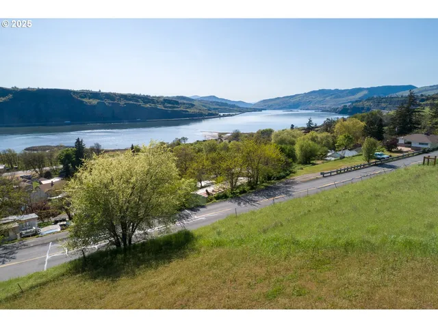 a view of a city and mountains ocean view