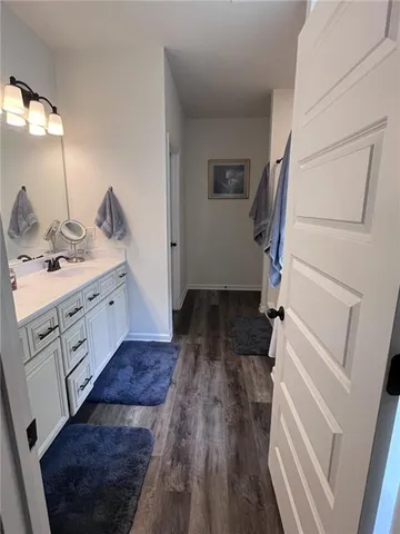 a bathroom with a toilet and a sink