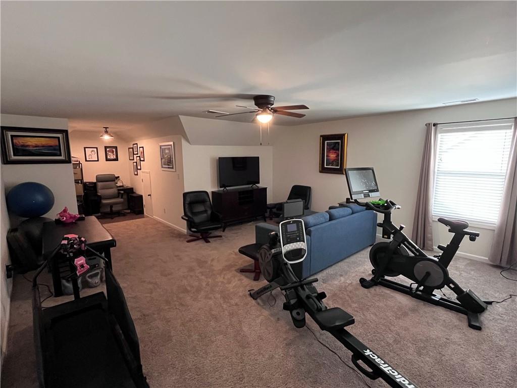 245 S Ridge Senoia, GA 30276 - Photo 23 of 25 a view of a livingroom with furniture and a window