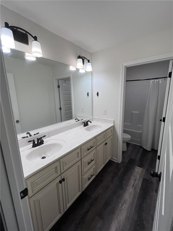 245 S Ridge Senoia, GA 30276 - Photo 24 of 25 a spacious bathroom with a double vanity sink a mirror and a shower