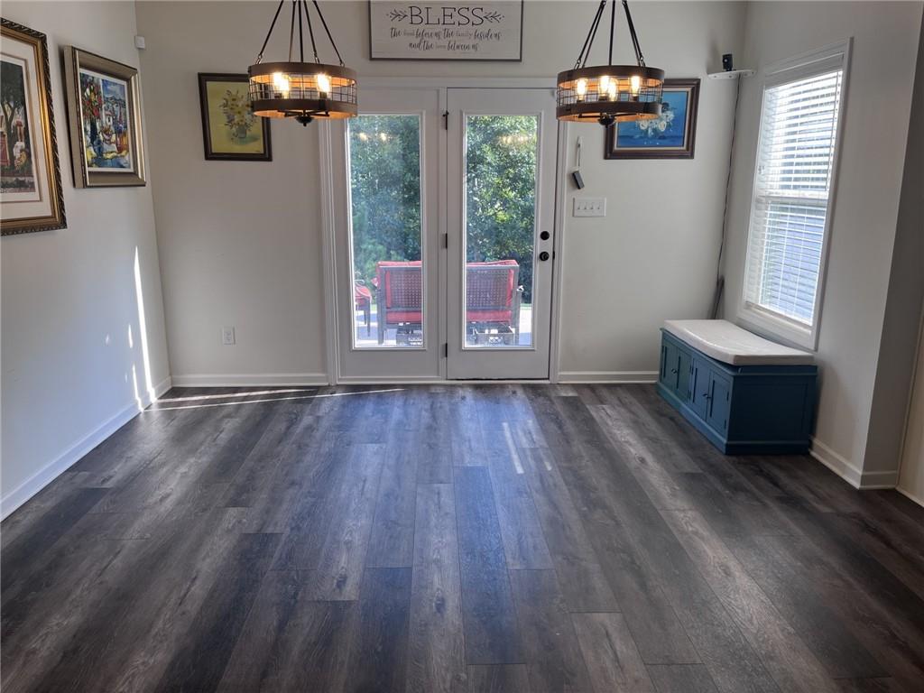245 S Ridge Senoia, GA 30276 - Photo 9 of 25 a view of livingroom with furniture wooden floor chandelier