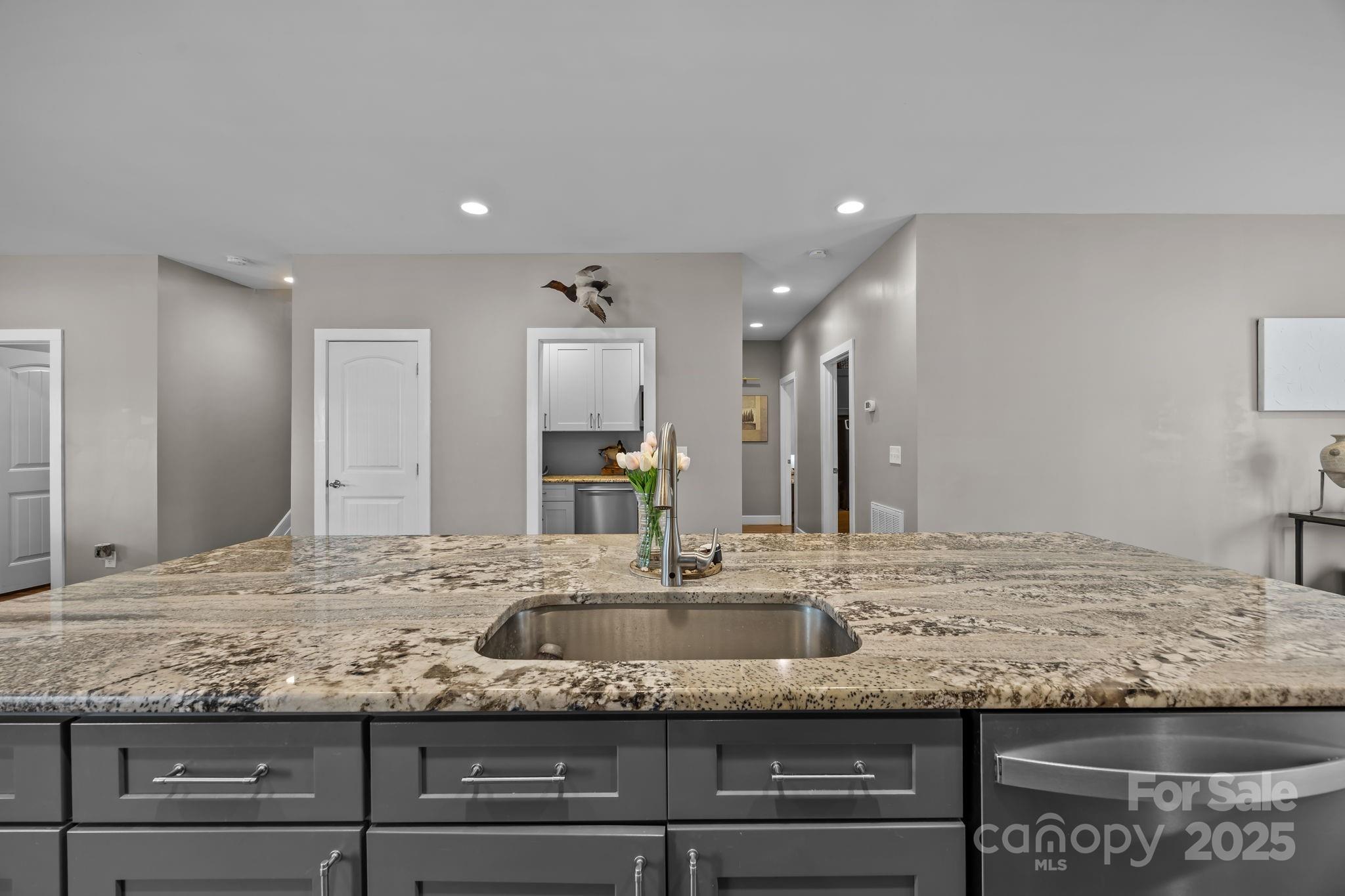 5321 Vesuvius Furnace Road Iron Station, NC 28080 - Photo 19 of 48 a bathroom with a granite countertop sink and a mirror