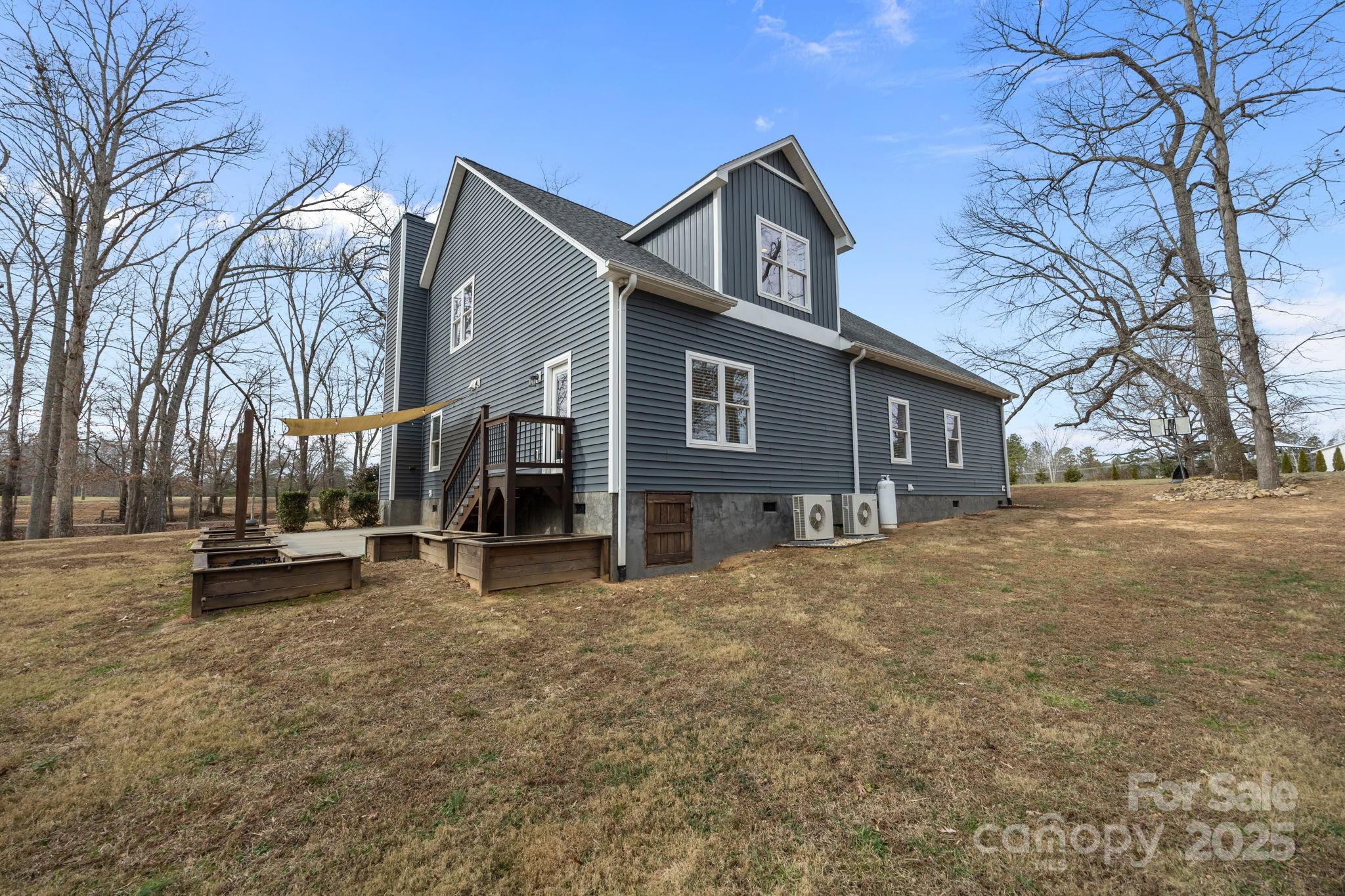 5321 Vesuvius Furnace Road Iron Station, NC 28080 - Photo 40 of 48 a view of a house with a snow on the road