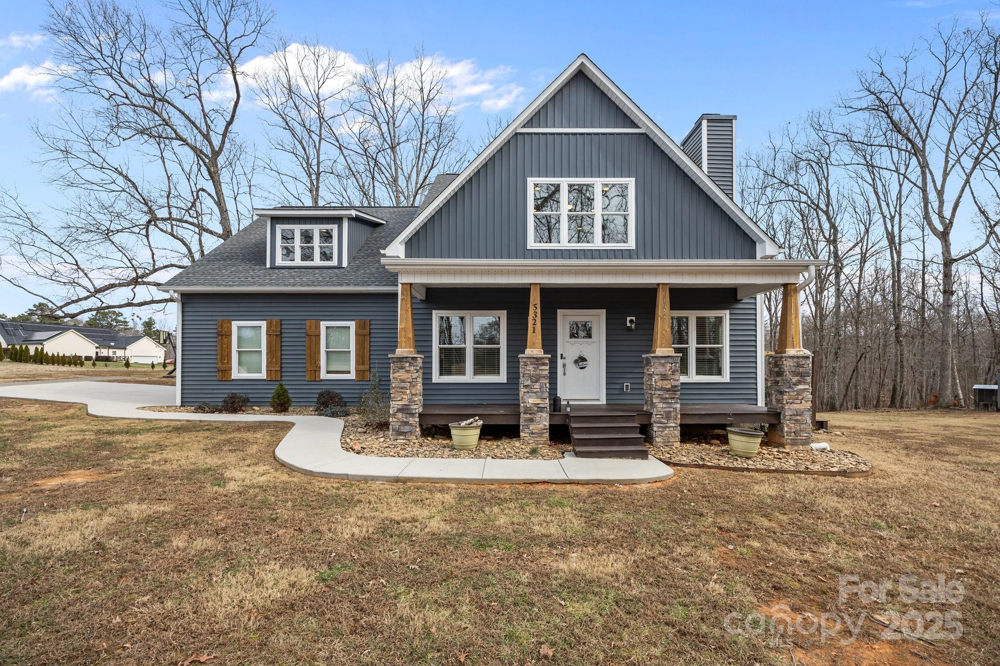 5321 Vesuvius Furnace Road Iron Station, NC 28080 - Photo 6 of 48 a front view of a house with garden