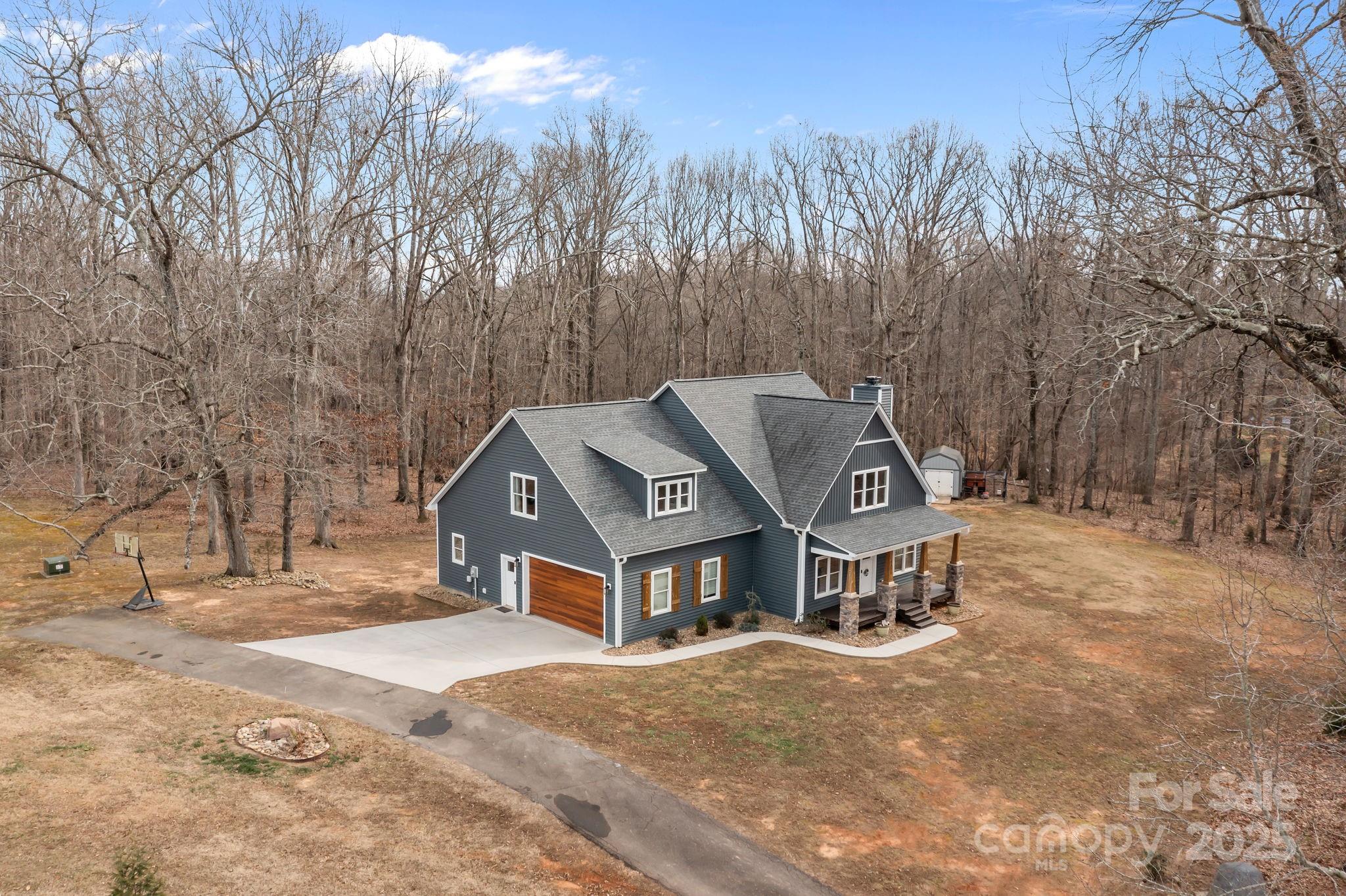 5321 Vesuvius Furnace Road Iron Station, NC 28080 - Photo 7 of 48 a front view of a house with a yard