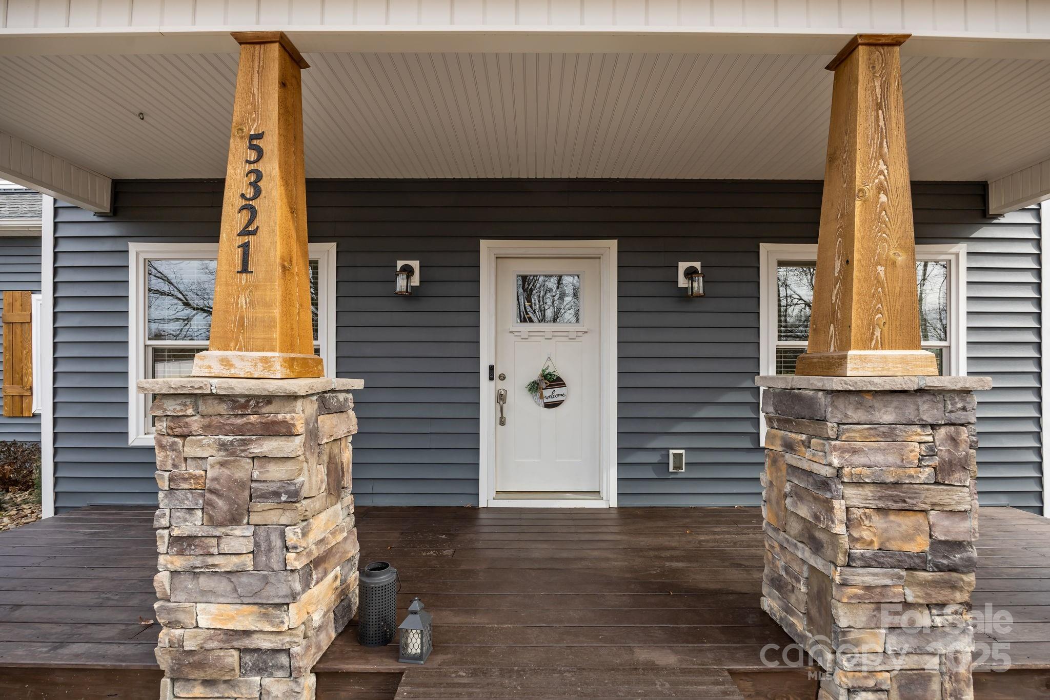 5321 Vesuvius Furnace Road Iron Station, NC 28080 - Photo 9 of 48 a front view of a house with many windows