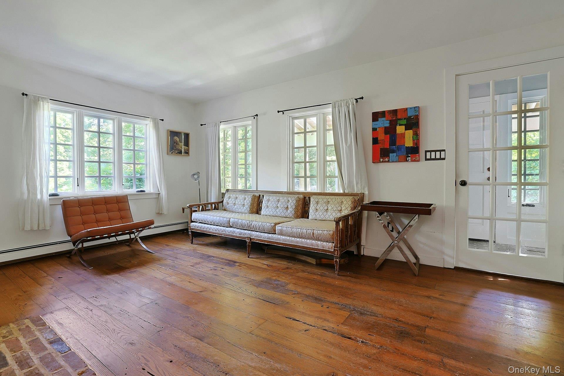 65 Douglas Road Chappaqua, NY 10514 - Photo 7 of 41 Beautifully filled with natural light, spacious living room with French doors leading outside