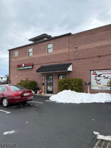 31 Frelinghuysen Avenue Raritan, NJ 08869 - Photo 2 of 3 a car parked in front of a building
