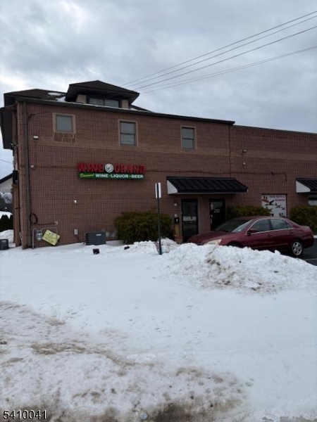 31 Frelinghuysen Avenue Raritan, NJ 08869 - Photo 3 of 3 a front view of a house with a yard