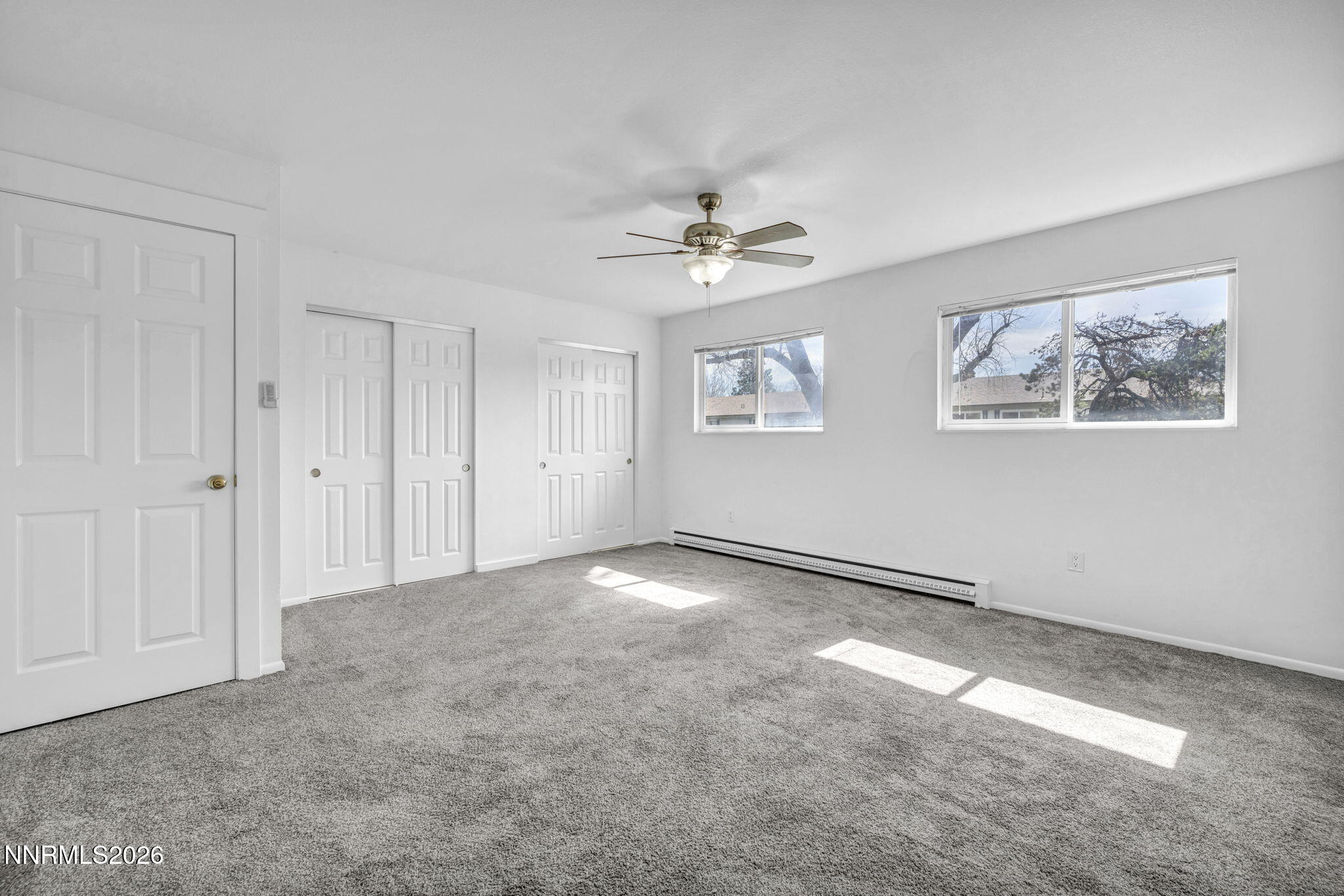 312 Smithridge Park Reno, NV 89502 - Photo 12 of 21 a view of an empty room with a window