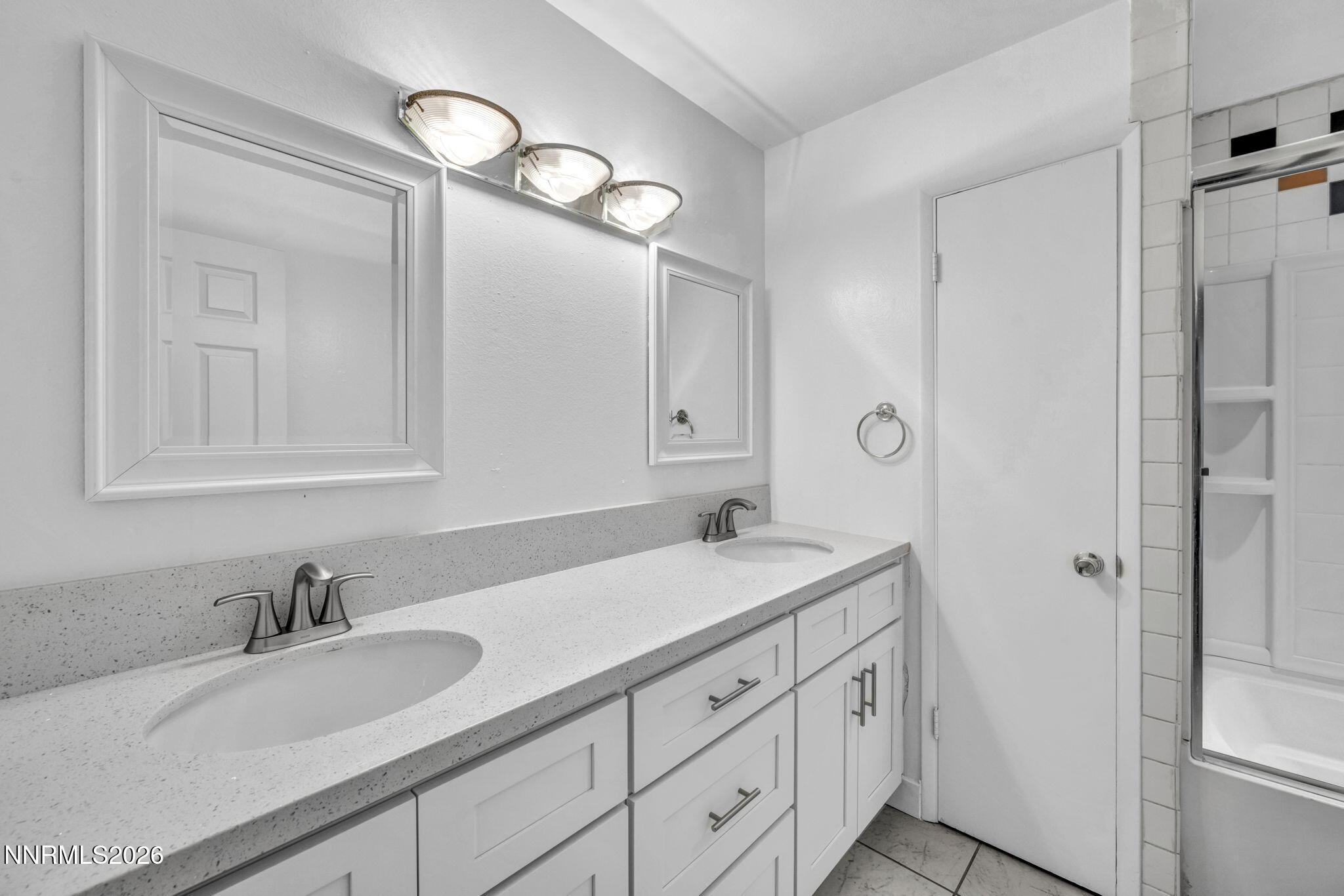 312 Smithridge Park Reno, NV 89502 - Photo 15 of 21 a bathroom with a granite countertop sink mirror and double