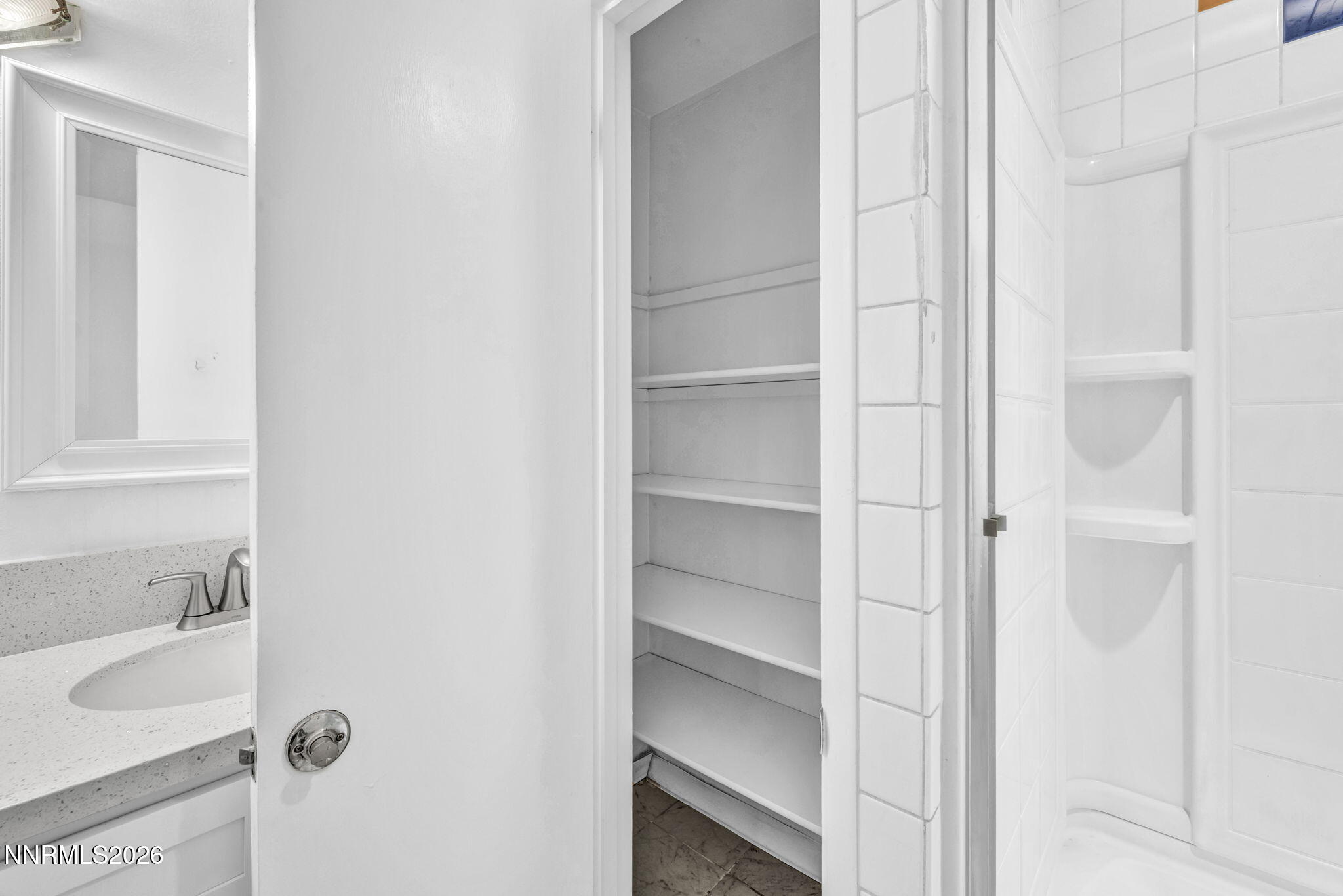 312 Smithridge Park Reno, NV 89502 - Photo 17 of 21 a bathroom with a sink and a shower