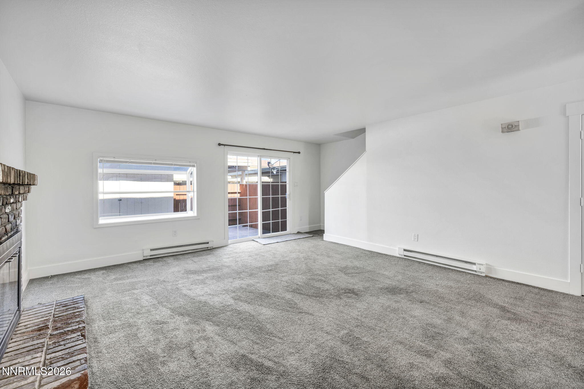 312 Smithridge Park Reno, NV 89502 - Photo 7 of 21 an empty room with windows