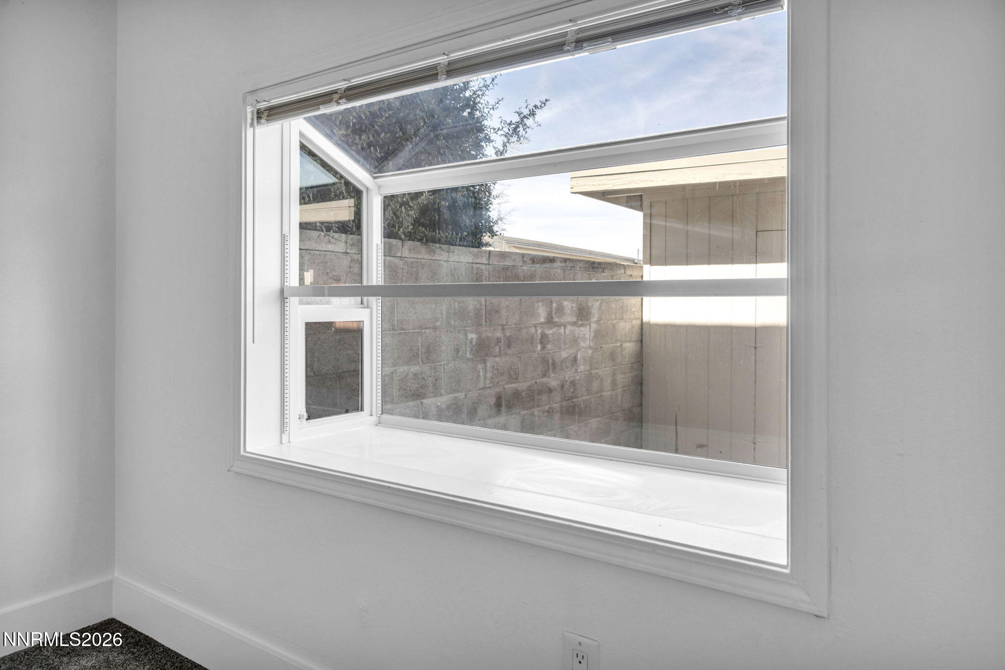 312 Smithridge Park Reno, NV 89502 - Photo 8 of 21 a bathroom with a glass door and a glass door