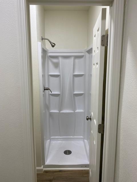 15792 Raymond Road Madera, CA 93638 - Photo 11 of 18 a bathroom with a tub