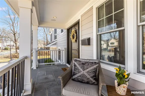 a view of balcony with furniture