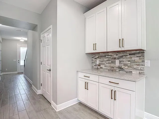 a view of a hallway with closet area