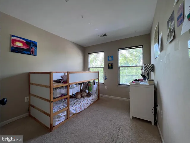 a room with furniture and window